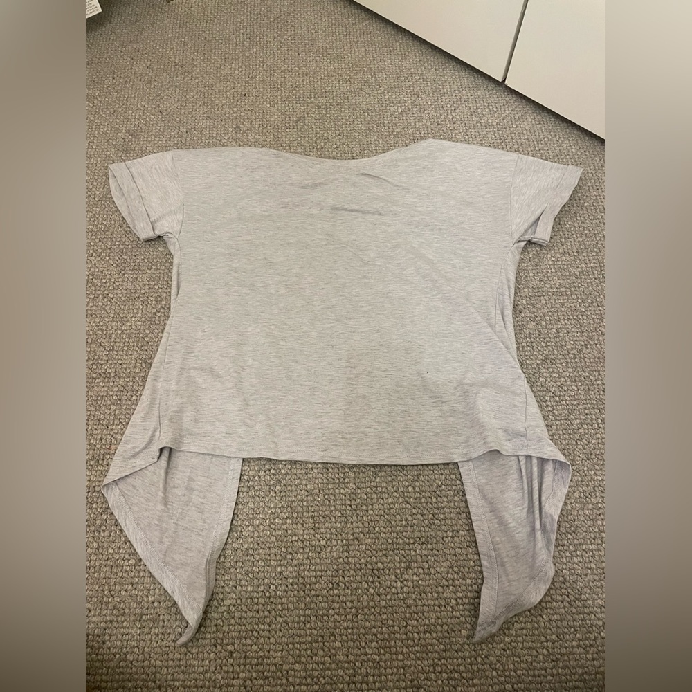 Light grey open back athletic tee shirt